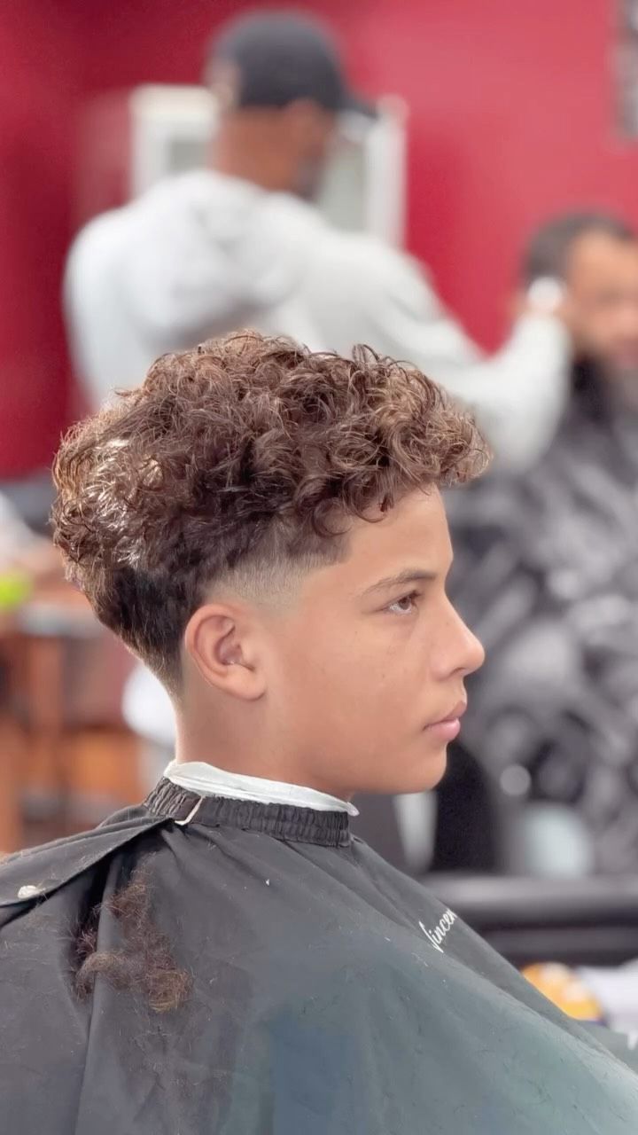 Curly haircut and clean fade by The Don LA